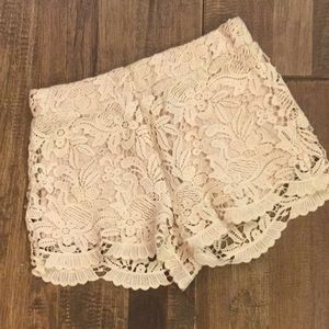 Adorable lace shorts with liner.